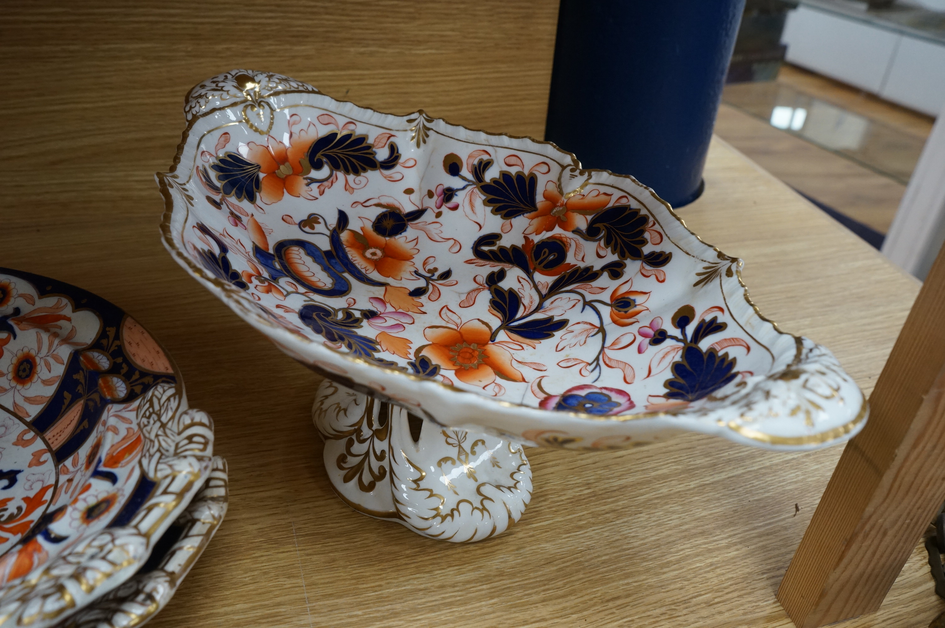 Fifteen items of a mid 19th century Mason's/Ashworth’s ironstone dinner service. Oval meat platter 48.5cm wide. Condition - three plates chipped, some losses to gilding